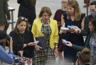 Sen. Shelley Moore Capito, R-W.Va., former lead GOP negotiator on President Joe Biden's infrastructure package, is met by reporters as she walks to the chamber for a vote, at the Capitol in Washington, Thursday, June 10, 2021. (AP Photo/J. Scott Applewhite)