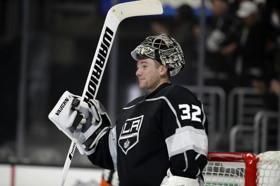 Los Angeles Kings goaltender Jonathan Quick smiles during a break in the first period of the team's NHL hockey game against the Philadelphia Flyers on Tuesday, Dec. 31, 2019, in Los Angeles. (AP Photo/Marcio Jose Sanchez)