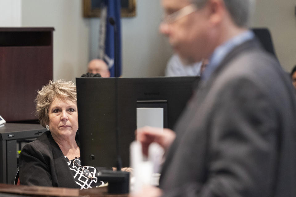 Colleton County Clerk of Court Rebecca Killy listens as Prosecutor Creighton Waters makes closing arguments in Alex Murdaugh's trial for murder at the Colleton County Courthouse on Wednesday, March 1, 2023, in Columbia, S.C. Attorneys for convicted murderer Alex Murdaugh want a new trial, accusing the court clerk of improperly influencing the jury and betraying her oath of office for money and fame.(Joshua Boucher/The State via AP, Pool)