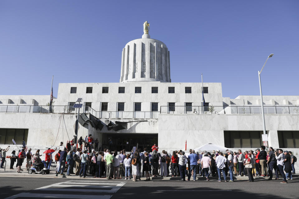 Jennifer Parrish Taylor, director of advocacy and public policy at the Urban League of Portland, speaks during a rally calling for an end to the Senate Republican walkout at the Oregon State Capitol in Salem, Ore., Thursday, May 11, 2023. (AP Photo/Amanda Loman)