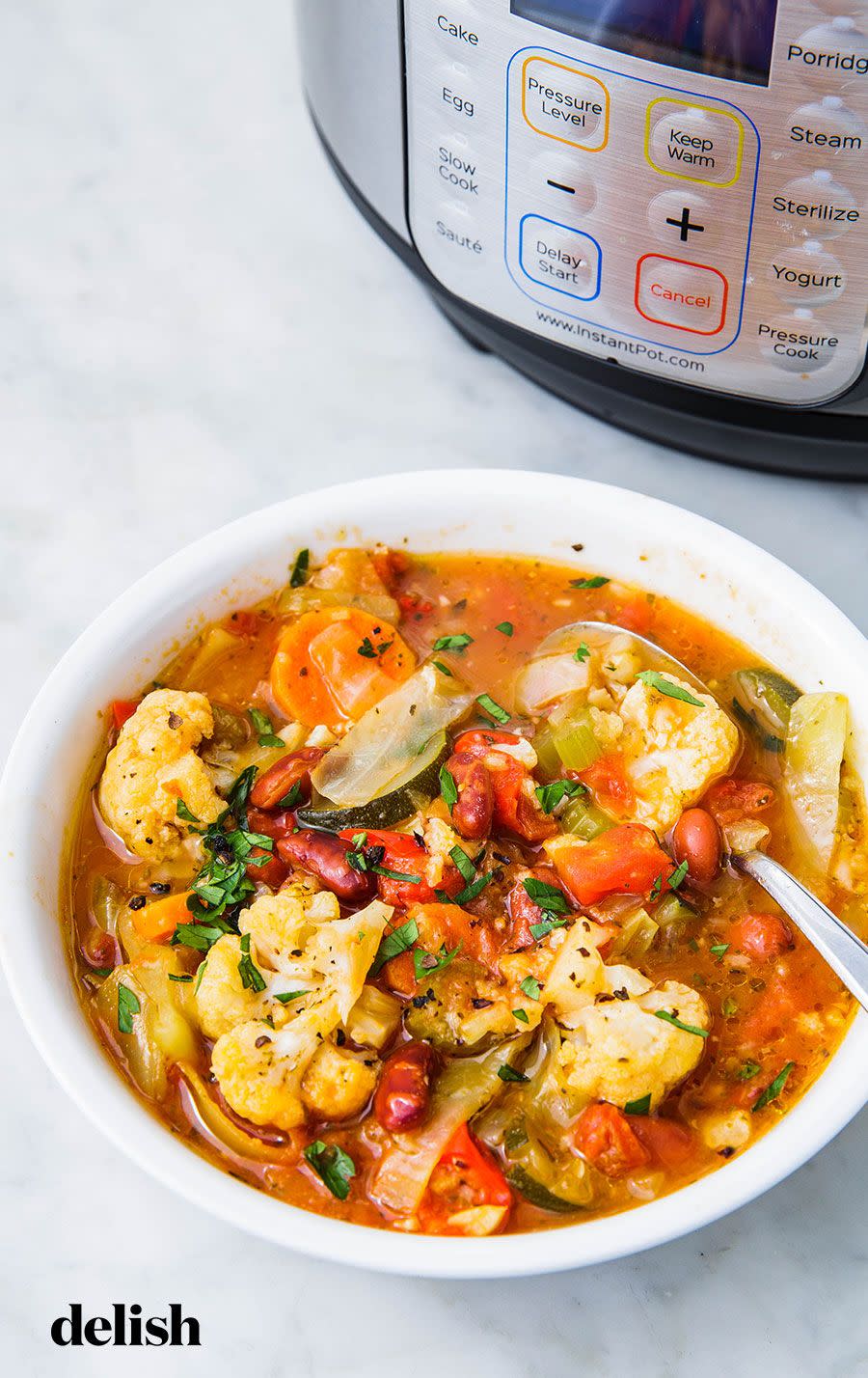 <p>Prep some vegetables, set the timer for 12 minutes, and call it a day!</p><p>Get the recipe from <a href="https://www.delish.com/cooking/recipe-ideas/a25336945/instant-pot-vegetable-soup/" rel="nofollow noopener" target="_blank" data-ylk="slk:Delish;elm:context_link;itc:0;sec:content-canvas" class="link ">Delish</a>.</p>