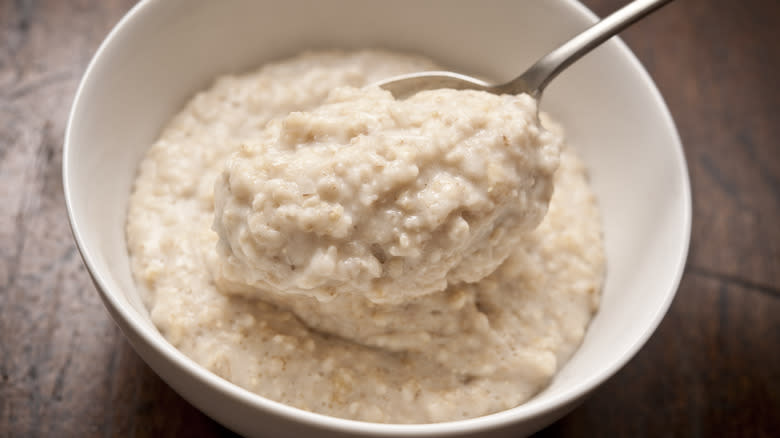 bowl of oatmeal with spoon