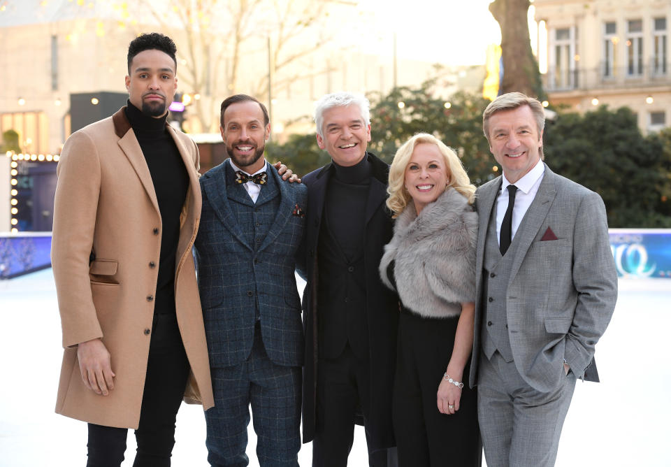 LONDON, ENGLAND - DECEMBER 19:  (L-R) Ashley Banjo, Jason Gardiner, Phillip Schofield, Jayne Torvill and Christopher Dean attend the Dancing On Ice 2018 photocall held at Natural History Museum Ice Rink on December 19, 2017 in London, England.  (Photo by Karwai Tang/WireImage)