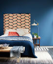 <p> If you're wondering if you can give your guest bedroom ideas a boost and it’s the sophistication you’re after, headboard ideas are the way to go; a headboard covered in a bold patterned fabric is a great starting point.  </p> <p> Introducing vibrantly colored walls and tactile fabrics to the mix is a good way to intensify the luxurious feel of the scheme.  </p>