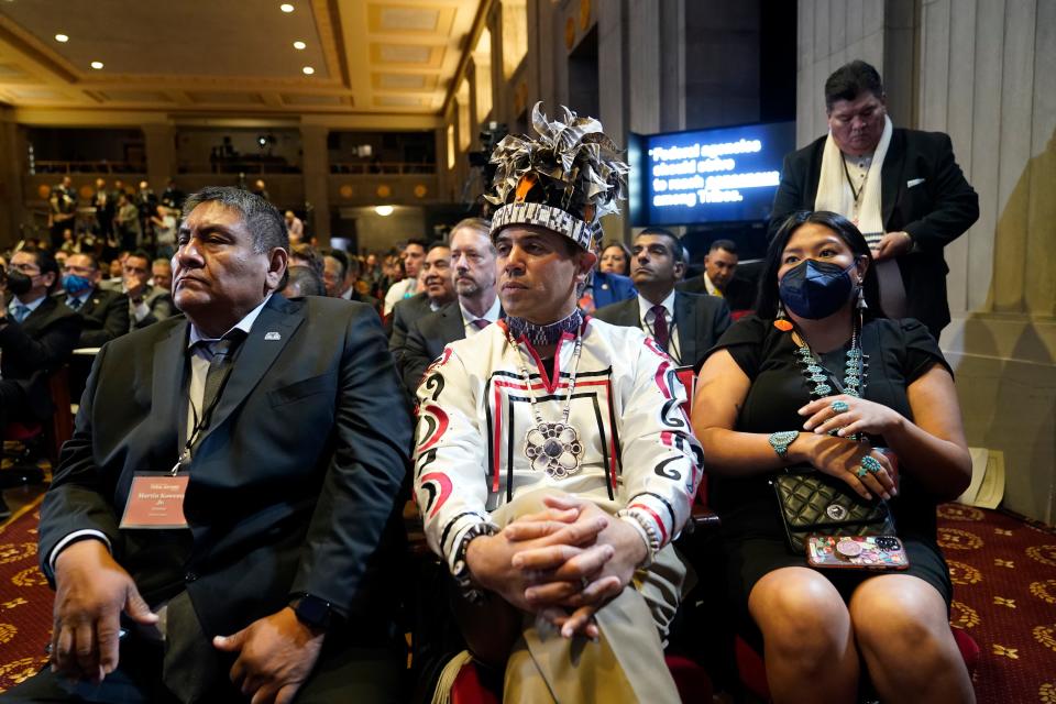 Audience members listen as President Joe Biden speaks at the White House Tribal Nations Summit at the Department of the Interior in Washington, Wednesday, Nov. 30, 2022.