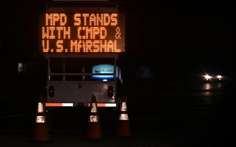 A mobile sign state that the Matthews Police Department stand with the Charlotte-Mecklenburg Police Dept and U.S. Marshals on Monday, April 29, 2024 in Charlotte, NC. Four law enforcement officers were killed and four others injured on Monday when members of the U.S. Marshals Service task force tried to serve a warrant in the Shannon Park area of east Charlotte. Three U.S. Marshals were killed and a CMPD later passed Monday evening.