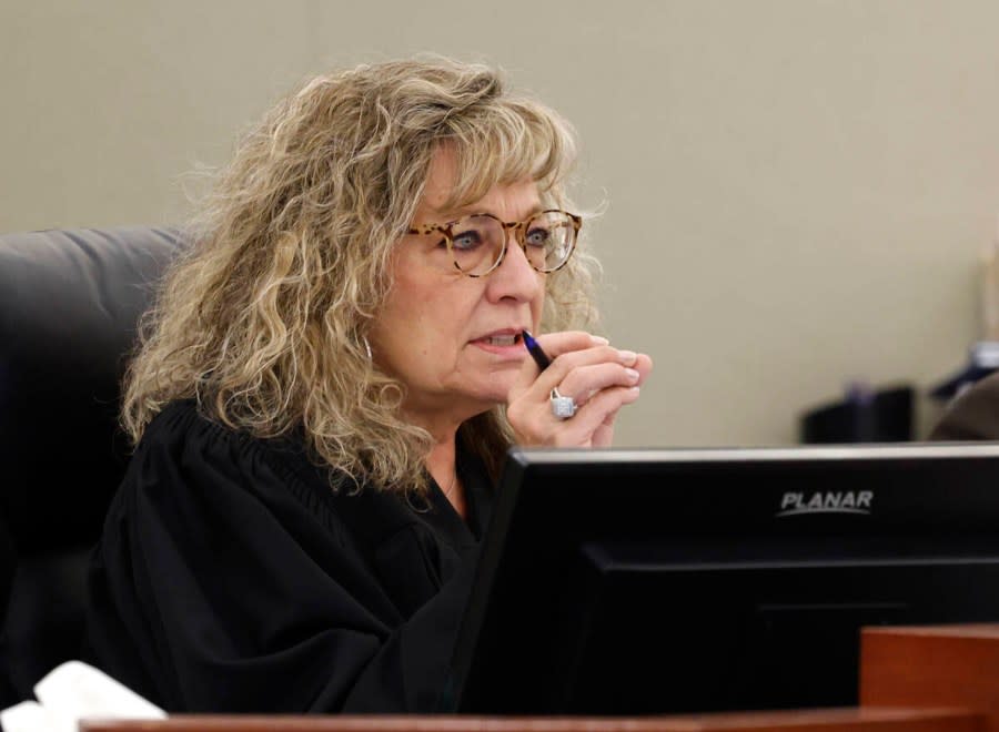 <em>Judge Mary Kay Holthus presides over the arraignment of Republican electors, accused in a fake elector scheme, as they appear remotely at the Regional Justice Center, on Monday, Dec. 18, 2023, in Las Vegas. (Bizuayehu Tesfaye/Las Vegas Review-Journal/Tribune News Service via Getty Images)</em>