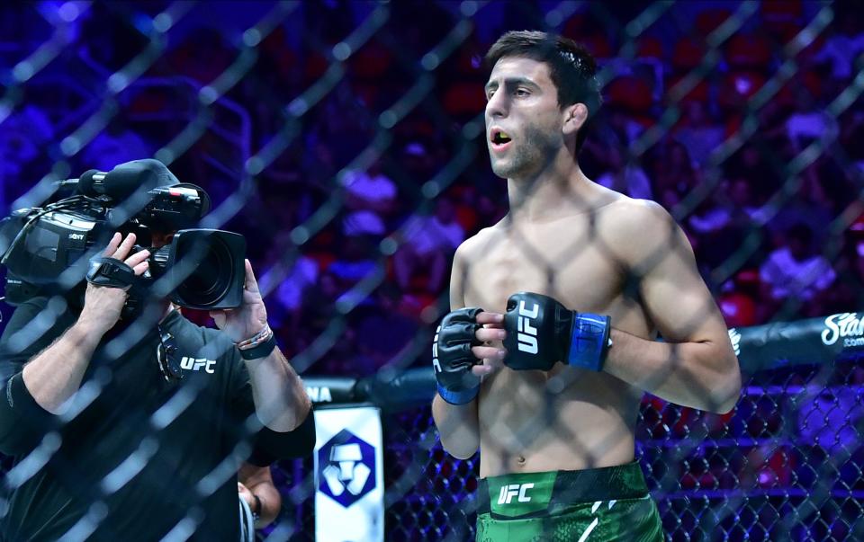 May 4, 2024; Rio de Janeiro, RJ, BRAZIL; Alexandre Pantoja (red gloves) fights Steve Erceg (blue gloves) during UFC 301 at Rio Arena. Mandatory Credit: Jason Silva-USA TODAY Sports