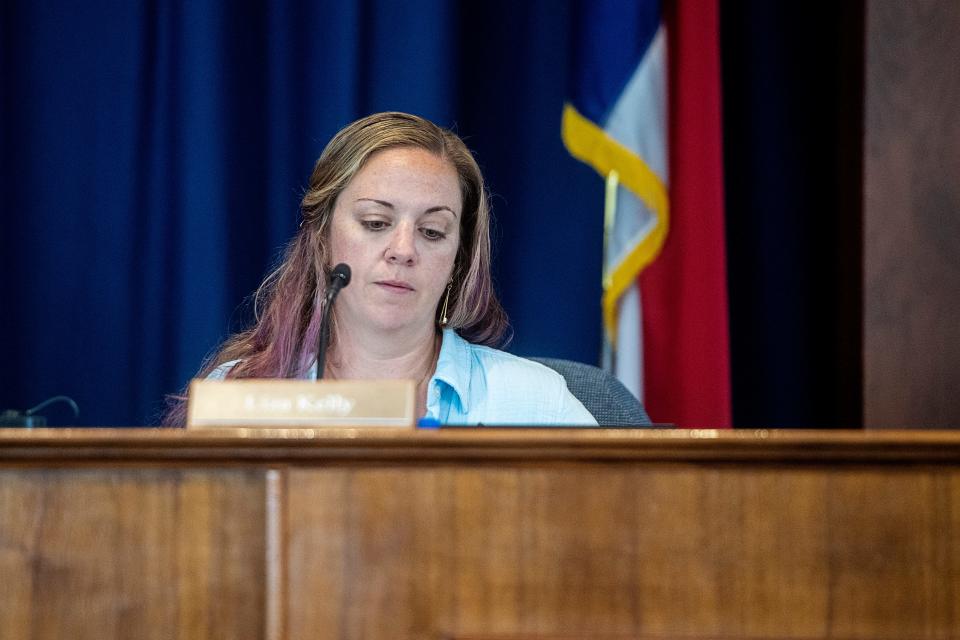 Asheville City School Board member Liza Kelly, seen here in a previous board meeting, voted March 11 against the consolidation of Asheville Middle and Montford North Star Academy.