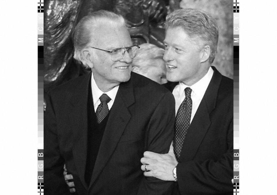 WASHINGTON, DC - JANUARY 20:  US President Bill Clinton (R) embraces Reverend Billy Graham (L) 20 January during the inaugural luncheon at the US Capitol in Washington DC. Earlier 20 January, US President Bill Clinton was sworn in as president for his second term.  (Photo credit should read JOYCE NALTCHAYAN/AFP/Getty Images)