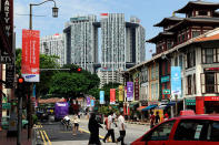 <b>4. Singapore</b> <br>5-year price growth: 50.5 percent <br><br>Singapore is the most expensive real estate market in Southeast Asia. The average price of a prime property in the city-state was $25,600 per square meter or $2,600 per square foot in the fourth quarter of 2011, according to Knight Frank. <br><br>The country also ranked as the <a href="http://www.cnbc.com/id/46450845" rel="nofollow noopener" target="_blank" data-ylk="slk:third most expensive city;elm:context_link;itc:0;sec:content-canvas" class="link ">third most expensive city</a> to rent high-end property in Asia last year after Hong Kong and Tokyo, according to research firm ECA International. Low interest rates and a wave of immigration in recent years have boosted demand for homes. <br><br>A regional financial hub, Singapore has a large foreign population that's helping to drive home prices. Foreigners make up more than one-third of Singapore’s 5.2 million people and accounted for <a href="http://www.reuters.com/article/2011/12/08/singapore-property-idUSL3E7N80FN20111208" rel="nofollow noopener" target="_blank" data-ylk="slk:18 percent of new homes sold;elm:context_link;itc:0;sec:content-canvas" class="link ">18 percent of new homes sold</a> in the third quarter of 2011, according to Citigroup. Among foreign buyers, mainland <a href="http://www.straitstimes.com/BreakingNews/Singapore/Story/STIStory_737938.html" rel="nofollow noopener" target="_blank" data-ylk="slk:Chinese are the largest group;elm:context_link;itc:0;sec:content-canvas" class="link ">Chinese are the largest group</a>, accounting for 30.6 percent of foreign sales in the third quarter of 2011, according to real estate firm DTZ. <br><br>Public discontent over soaring property prices has led the government to implement measures to cool the market. In December, the government hit foreign property buyers with an <a href="http://www.straitstimes.com/BreakingNews/Singapore/Story/STIStory_744048.html" rel="nofollow noopener" target="_blank" data-ylk="slk:additional stamp duty equal to 10 percent;elm:context_link;itc:0;sec:content-canvas" class="link ">additional stamp duty equal to 10 percent</a> of the property value. This has contributed to property prices marking their <a href="http://www.reuters.com/article/2012/04/02/singapore-economy-property-idUSL3E8F201T20120402" rel="nofollow noopener" target="_blank" data-ylk="slk:first quarterly fall in nearly three years;elm:context_link;itc:0;sec:content-canvas" class="link ">first quarterly fall in nearly three years</a> of 0.1 percent in January to March this year. <br><br>Pictured left: Singapore's Chinatown area