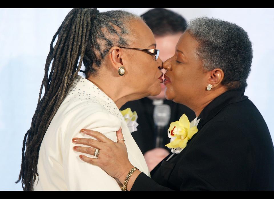 Darlene Garner (L) and Candy Holmes (R), both are reverends of Metropolitan Community Churches, exchange kisses during their wedding ceremony on the first day same-sex couples were legal to wed under a new law March 9, 2010. 