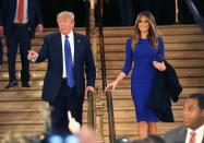 <p>For a presidential debate look, Melania stuck to her usual fitted style in a royal blue midi-length dress and matching box clutch. <i>[Photo: Getty]</i> </p>