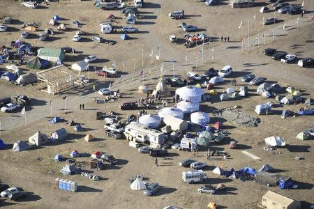 Dakota Access Pipeline protesters are seen at the Oceti Sakowin campground near the town of Cannon Ball, North Dakota, U.S. November 19, 2016 in an aerial photo provided by the Morton County Sheriff's Department. Morton County Sheriff's Department/Handout via REUTERS