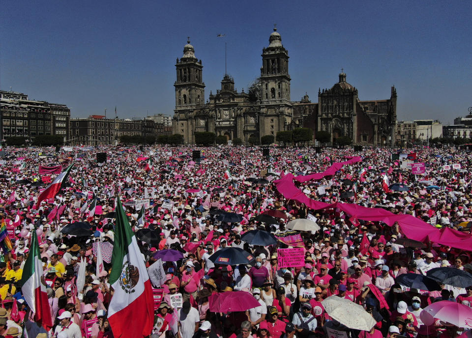 Anti-government demonstrators protest against recent reforms pushed by President Andres Manuel Lopez Obrador to the country's electoral law that they say threaten democracy, in Mexico City's main square, The Zocalo, Sunday, Feb. 26, 2023. (AP Photo/Fernando Llano)