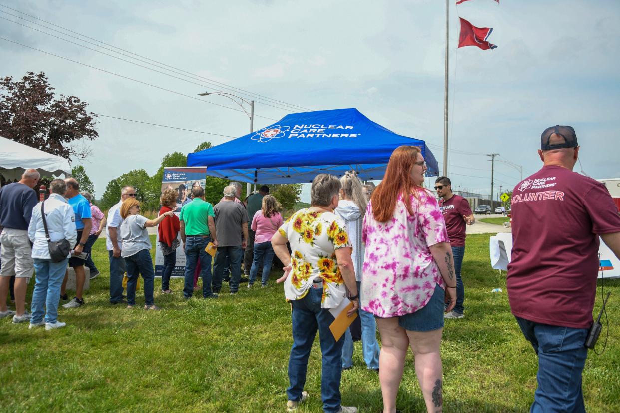 Attendees line up to learn more about Nuclear Care Partners during the K-25 first annual reunion on Saturday, April 27, 2024 in Oak Ridge, Tenn.