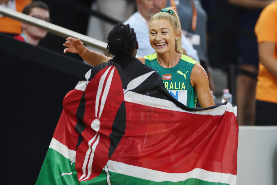 Jessica Hull, pictured here congratulating Faith Kipyegon.