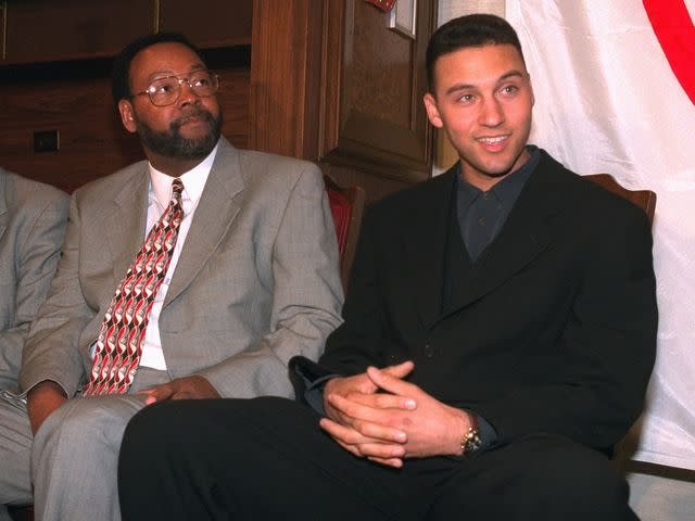 <p>John Roca/NY Daily News/Getty</p> Derek Jeter and his father, Dr. Sanderson Charles Jeter, in 1995