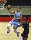 Memphis Grizzlies guard Desmond Bane (22) shoots as Houston Rockets guard John Wall (1) defends during the third quarter of an NBA basketball game Sunday, Feb. 28, 2021, in Houston. (Troy Taormina/Pool Photo via AP)