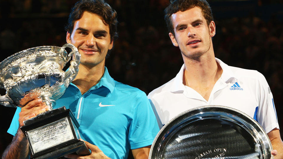 Roger Federer and Andy Murray after 2010 Australian Open final. (Photo by Clive Brunskill/Getty Images)