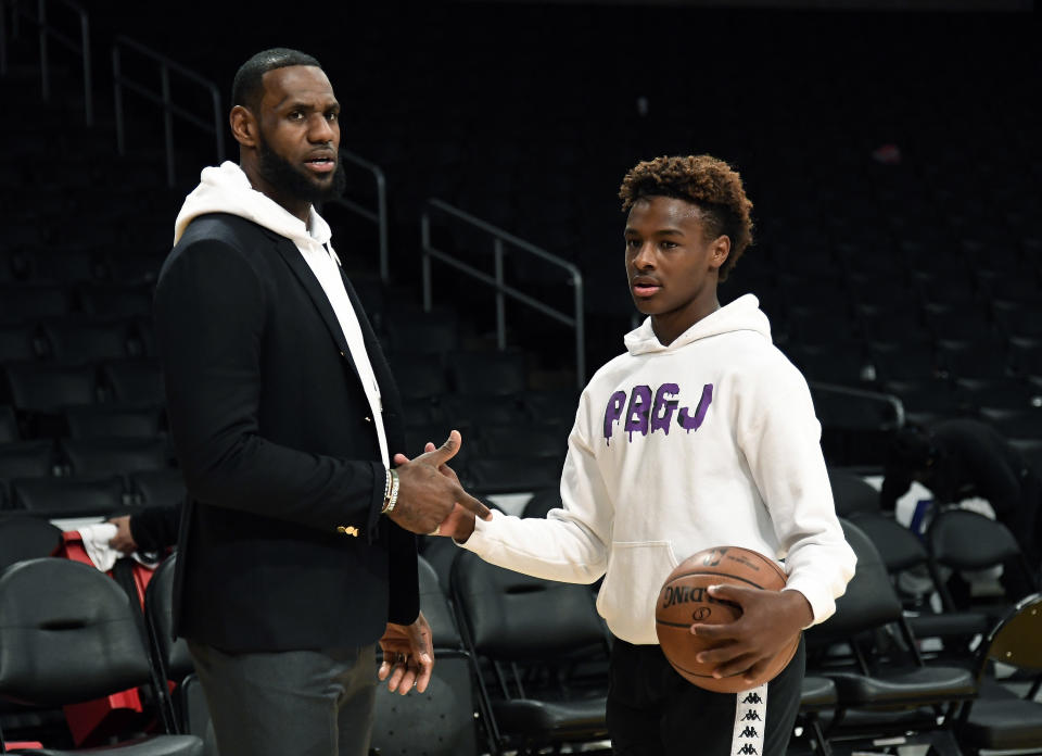 LOS ANGELES, CA - DECEMBER 28: LeBron James #23 of the Los Angeles Lakers and his son LeBron James Jr., on the court after the Los Angeles Clippers and Los Angeles Lakers basketball game at Staples Center on December 28, 2018 in Los Angeles, California. NOTE TO USER: User expressly acknowledges and agrees that, by downloading and or using this photograph, User is consenting to the terms and conditions of the Getty Images License Agreement. (Photo by Kevork Djansezian/Getty Images)