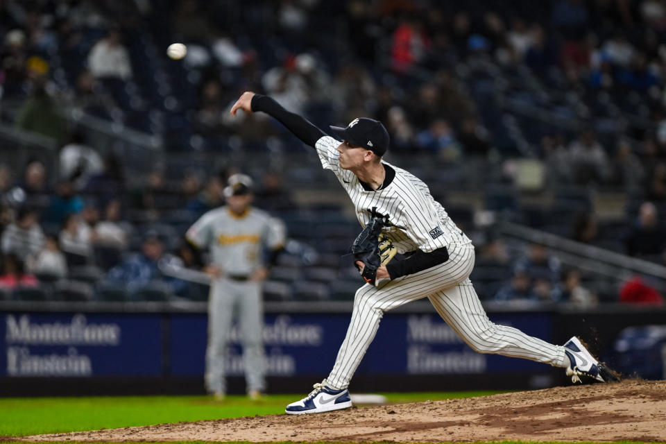 September 29, 2024; Bronx, New York, USA; New York Yankees pitcher Luke Weaver (30) pitches against the Pittsburgh Pirates during the eighth inning at Yankee Stadium. Mandatory credit: John Jones-Imagn images