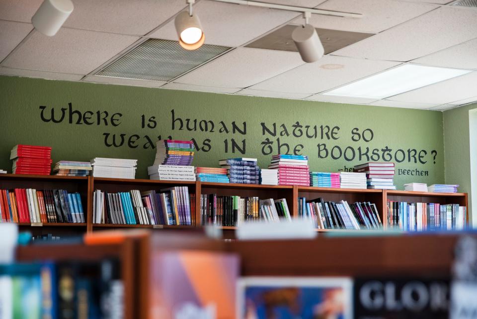 A quote by Henry Ward Beecher reads, "Where is human nature so weak as in the bookstore?" at Beaverdale Books.