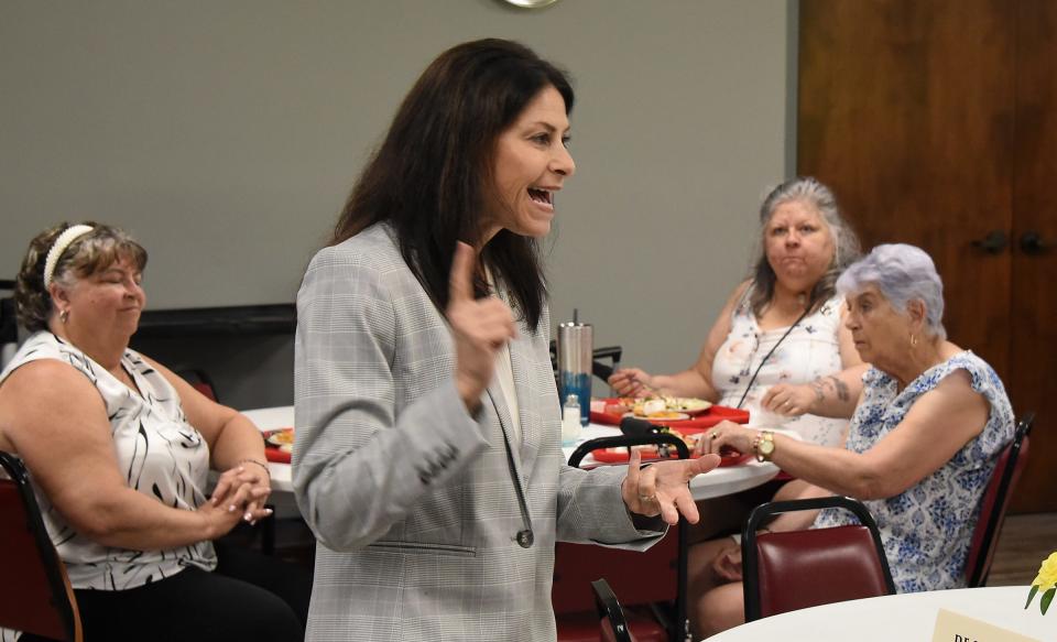 Michigan Attorney General Dana Nessel talks about senior scams Tuesday at the Frenchtown Center for Active Adults.