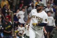 Milwaukee Brewers' Rowdy Tellez flips his bat after hitting a two-run home run during the sixth inning of a baseball game against the Washington Nationals Friday, May 20, 2022, in Milwaukee. (AP Photo/Morry Gash)