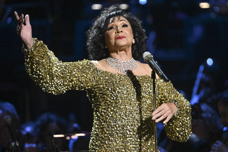 LONDON, ENGLAND - OCTOBER 04: Dame Shirley Bassey performs on stage accompanied by The Royal Philharmonic Concert Orchestra during The Sound of 007 in concert at The Royal Albert Hall on October 04, 2022 in London, England. (Photo by Jeff Spicer/Getty Images for EON Productions & Prime Video)