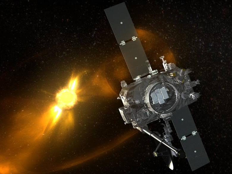 Artist rendition of STEREO spacecraft viewing a coronal mass ejection: Nasa