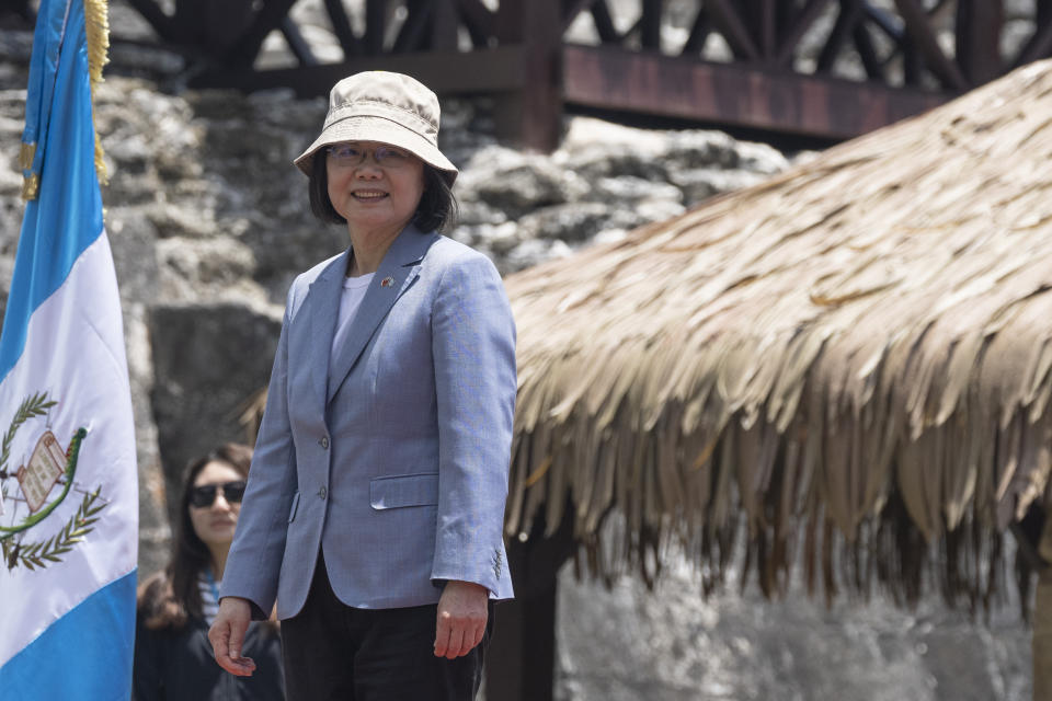 Taiwan's President Tsai Ing-wen stands ready for an official photo opportunity during her visit to the Mayan site Tikal, in Peten, Guatemala, Saturday, April 1, 2023. Tsai is in Guatemala for an official three-day visit. (AP Photo/Moises Castillo)