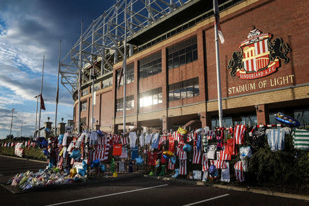 Tributes are placed outside the Stadium of Light in memory of Sunderland fan Bradley Lowery who died last week from cancer, in Sunderland, Britain July 13, 2017. Picture taken July 13, 2017. REUTERS/Mary Turner