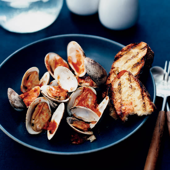 <p>"You can't get lazier than this," says Marcia Kiesel, who simply puts clams on the hot grill and waits a minute or two for them to open and start sizzling. Then she takes them off the heat and tops them with a spicy sauce spiked with horseradish and Tabasco.</p>