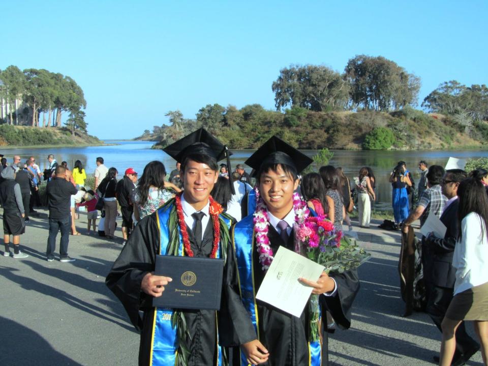 Two boys graduating from University of California, Santa Barbara