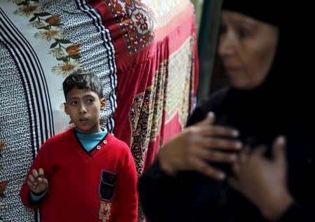 Abd-Elrahman, son of Amr Abushanab, who died in police custody, is pictured during an interview with Reuters at their family house in Tahanoub village November 30, 2015. Picture taken November 30, 2015. To match EGYPT-POLICE/DEATH REUTERS/Amr Abdallah Dalsh