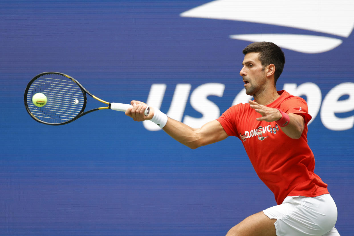 NEW YORK, NEW YORK - AUGUST 28: Novak Djokovic of Serbia returns the ball during a practice session prior to the start of the 2021 US Open at USTA Billie Jean King National Tennis Center on August 28, 2021 in the Queens borough of New York City. (Photo by Sarah Stier/Getty Images)