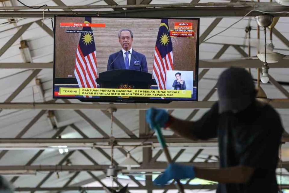 A live broadcast of Prime Minister Tan Sri Muhyiddin Yassin unveiling the Covid-19 stimulus package in Kuala Lumpur March 27, 2020. ― Picture by Yusof Mat Isa