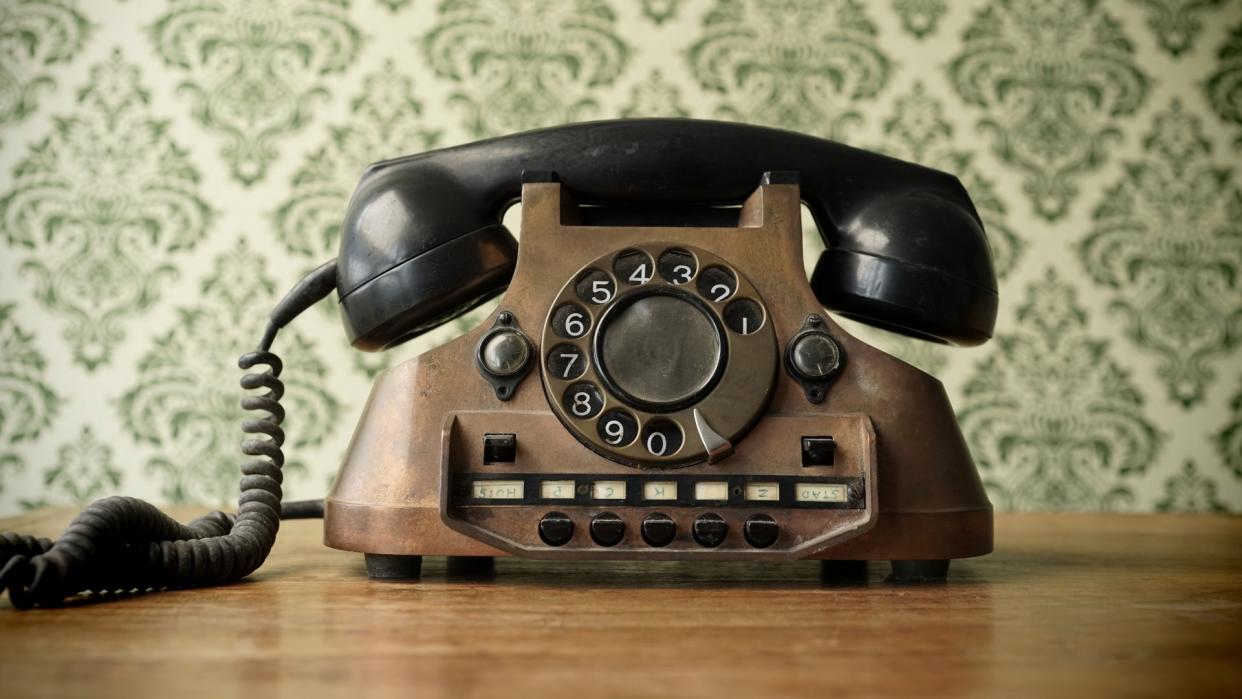  Old telephone made of copper 