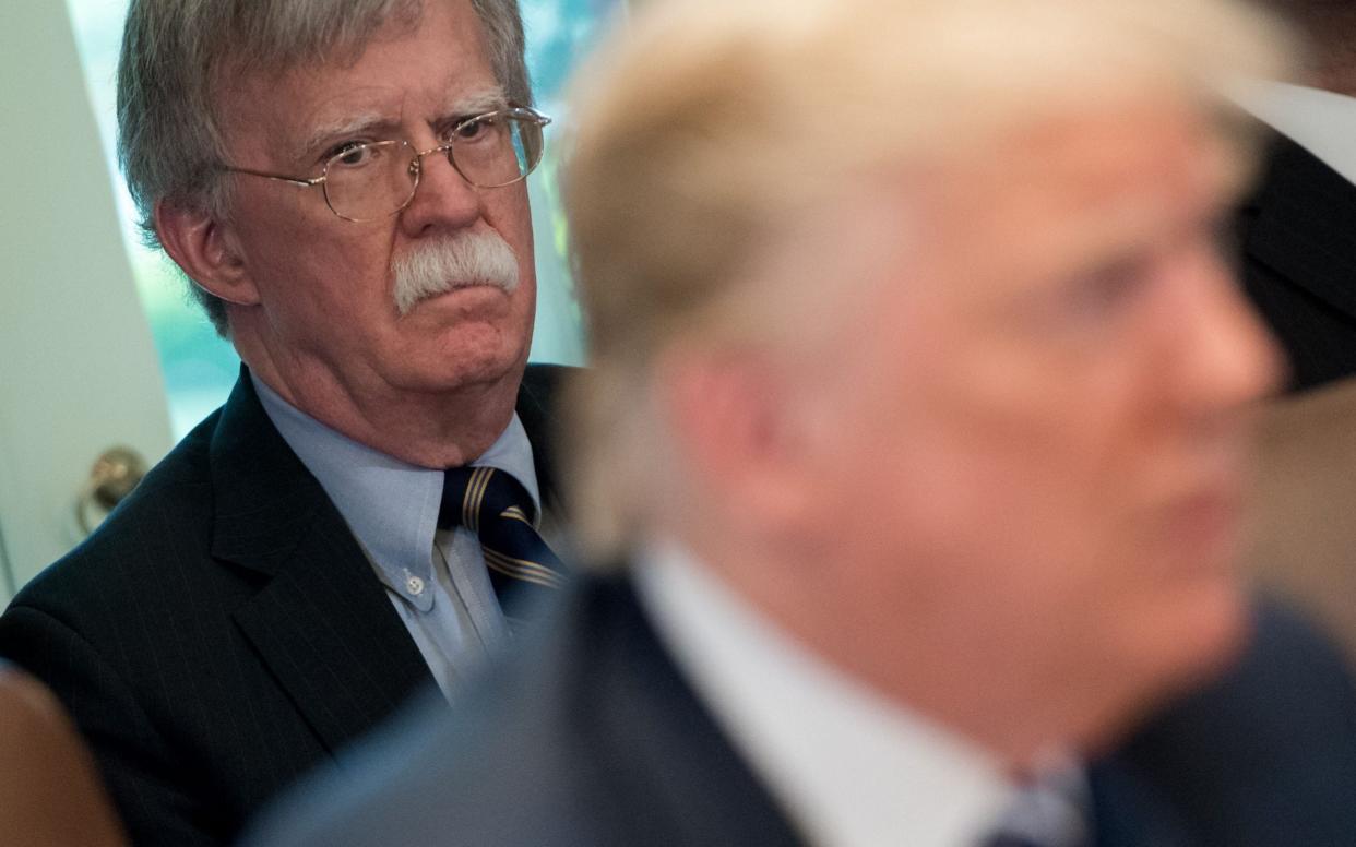 John Bolton has turned on his former boss - GETTY IMAGES