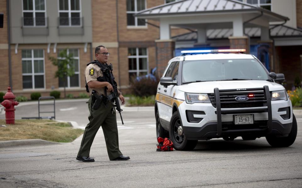 Police at the scene of the mass shooting in Highland Park - Jim Vondruska/Getty Images