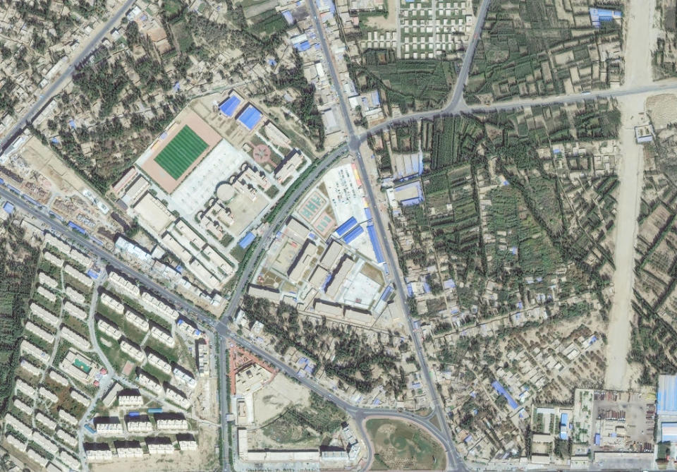 Maxar satellite imagery of a re-education internment camp in
Hotan, Xinjiang, China. Source: Satellite image 2019 Maxar Technologies/AAP