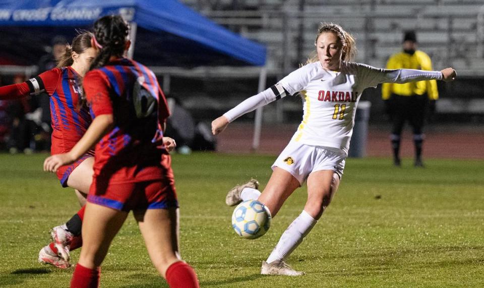 Oakdale’s Claire McGee Brown takes a shot on goal in the first half of the Valley Oak League game with East Union at East Union High School in Manteca, Calif.,Wednesday, Jan. 10, 2024.