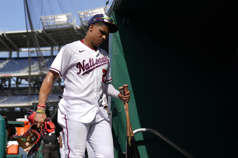 Washington Nationals' Juan Soto walks out of the dugout after the first game of a baseball doubleheader against the Philadelphia Phillies, Friday, June 17, 2022, in Washington. Philadelphia won 5-3. (AP Photo/Patrick Semansky)