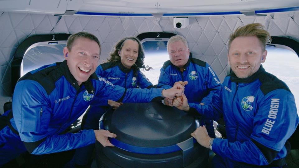 William Shatner and the crew of Blue Origin.