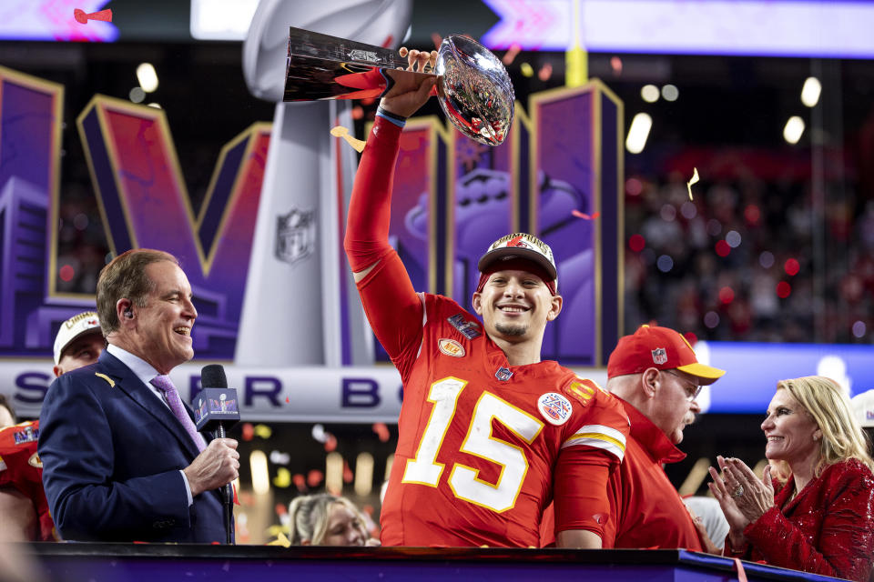 Quarterback Patrick Mahomes #15 of the Kansas City Chiefs celebrates with the Vince Lombardi Trophy following the team's Super Bowl LVIII victory over the San Francisco 49ers at Allegiant Stadium in Las Vegas on Feb. 11, 2024. / Credit: Michael Owens / Getty Images