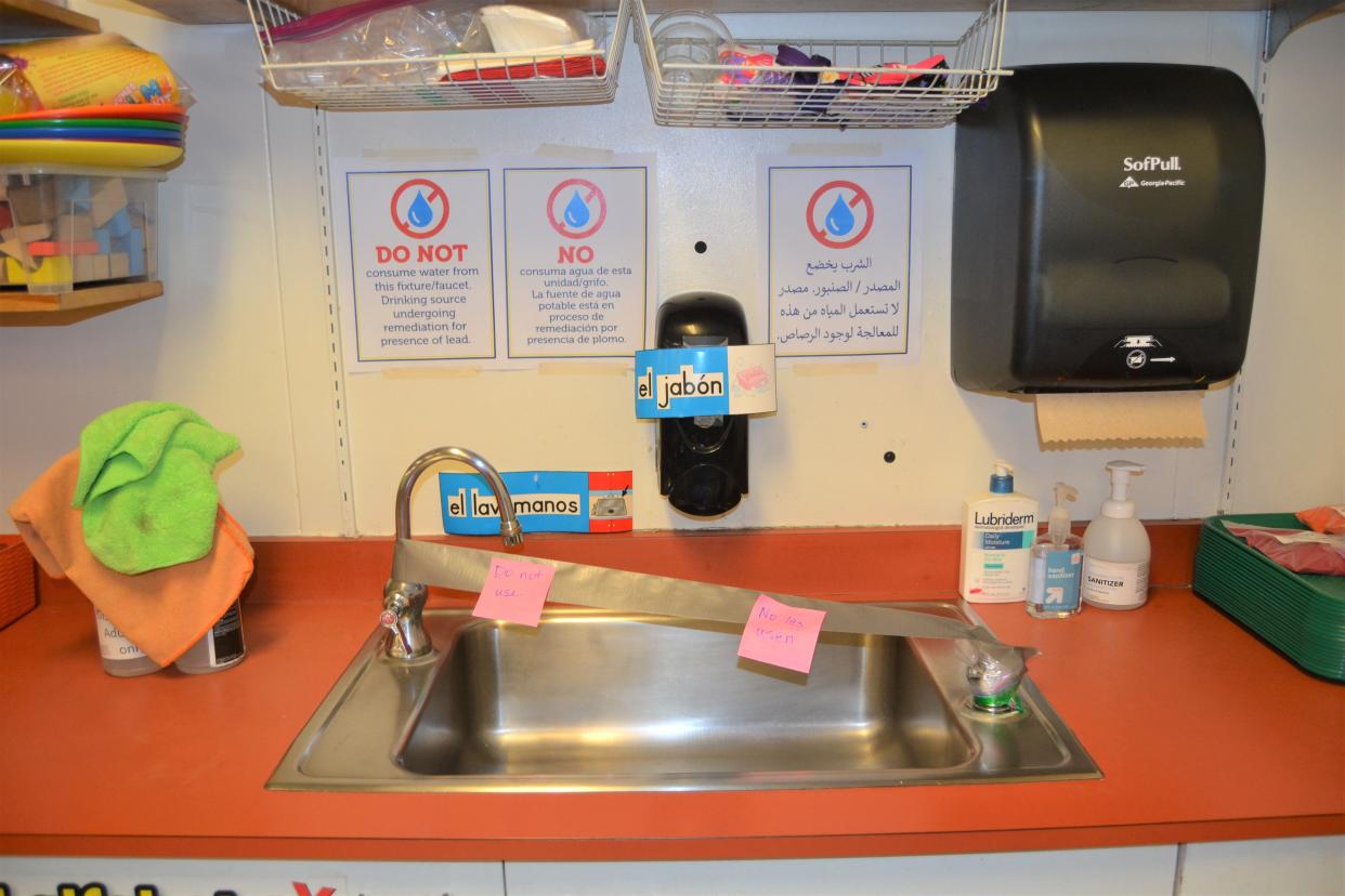 Signs and other notifications that it not be used are posted on and around the faucets of a classroom sink at Irish Elementary School in Fort Collins, Colo., that was shut off this week by Poudre School District after it was found to have levels of lead above the actionable threshold set by a new state law. Water fixtures at multiple PSD schools have been shut off after testing above the threshold, a district spokesperson said.