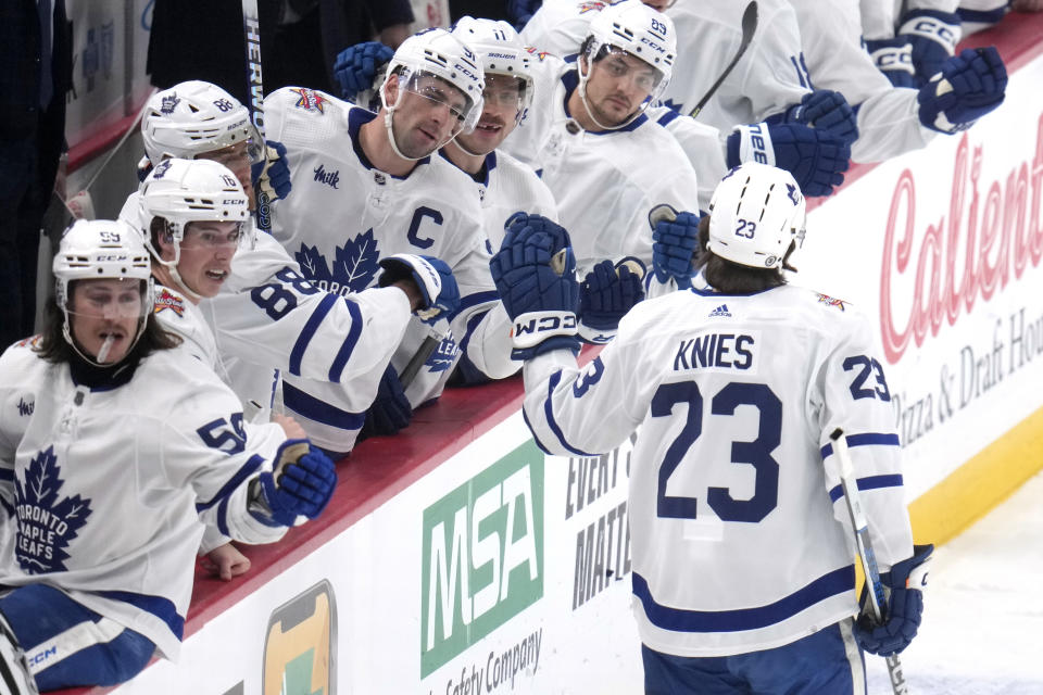 Toronto Maple Leafs' Matthew Knies (23) returns to the bench after scoring against the Pittsburgh Penguins during the first period of an NHL hockey game in Pittsburgh, Saturday, Nov. 25, 2023. (AP Photo/Gene J. Puskar)