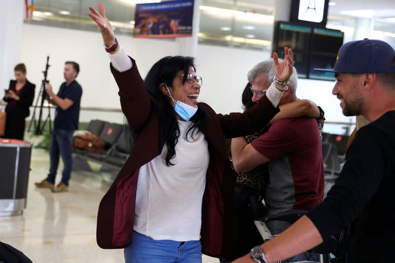 Passengers arrive from New Zealand after the Trans-Tasman travel bubble opened overnight, at Sydney Airport