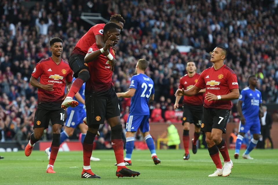 Paul Pogba is congratulated by his team-mates after scoring the opener.